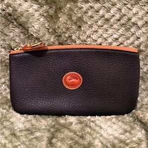Dooney and Bourke slim zip pouch.